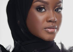 Stunning portrait of a fashionable woman wearing a hijab, capturing grace and beauty.